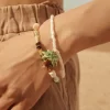 white seed bead bracelet with coconut charm for women
