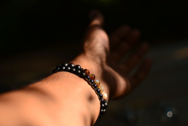 black bead bracelet meaning