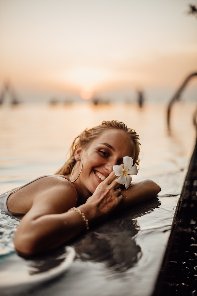 how long to wait to swim after ear piercing