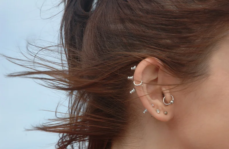 how to cover ear piercing for swimming
