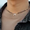 grey beaded necklace with moon